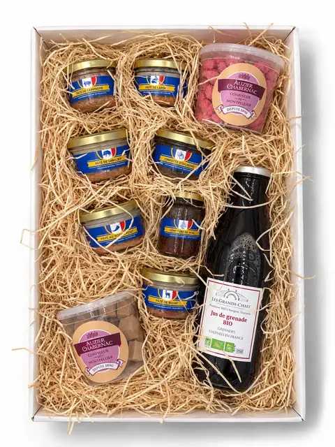 Coffret Occitanie ouvert, composition Découverte : pâtés et compotée en bocaux, confiseries et jus de grenade