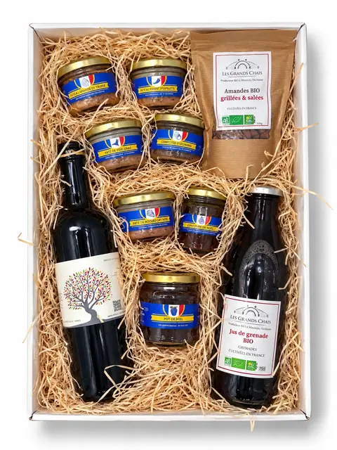 Coffret Occitanie ouvert, composition Premium : pâtés en bocaux, miel, amandes grillées, jus de grenade et vin rouge