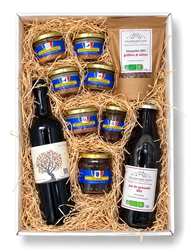 Coffret Occitanie ouvert, composition Premium : pâtés en bocaux, miel, amandes grillées, jus de grenade et vin rouge